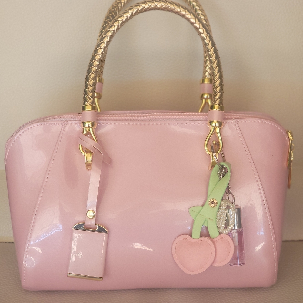 Elegant Pink Handbag with Gold Accents - Picture 7 of 7
